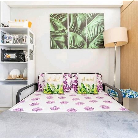 كويزون سيتي Grass Residences Sm North Edsa And Trinoma المظهر الخارجي الصورة