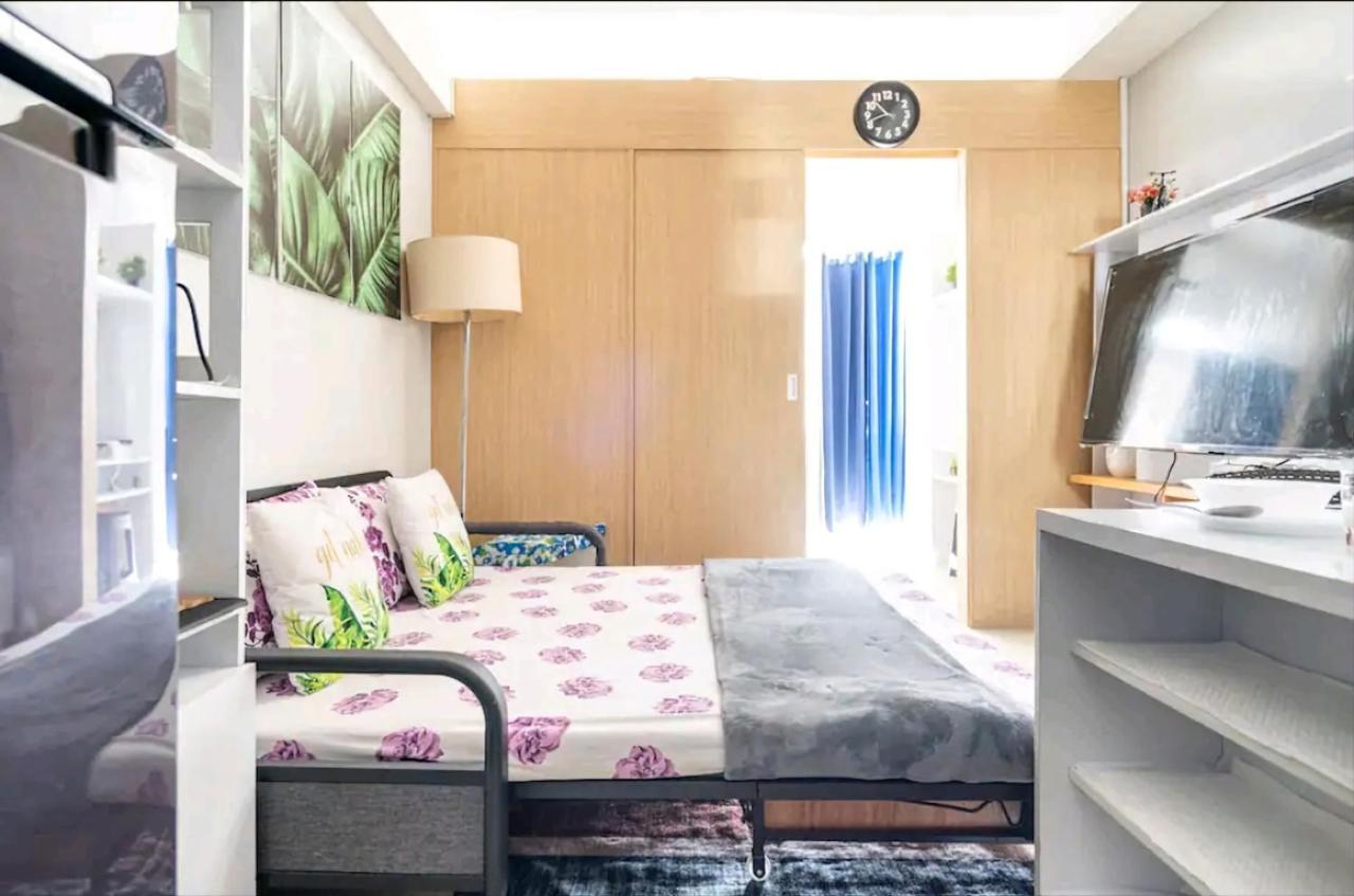 كويزون سيتي Grass Residences Sm North Edsa And Trinoma المظهر الخارجي الصورة